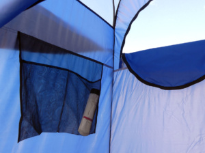 Mesh bag inside shower tent